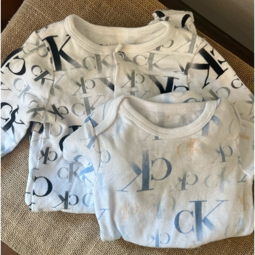 Calvin Klein long sleeve and short sleeve onesie. 3-6 month.